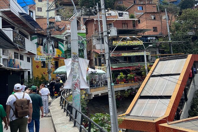 City Tour Through Medellin and Graffitour Through Comuna 13 - Exploring Plaza Botero and Parque Berrio