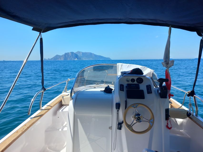 Torre Annunziata: Cala Di Mitigliano Snorkeling Tour by Boat - Instructor and Tour