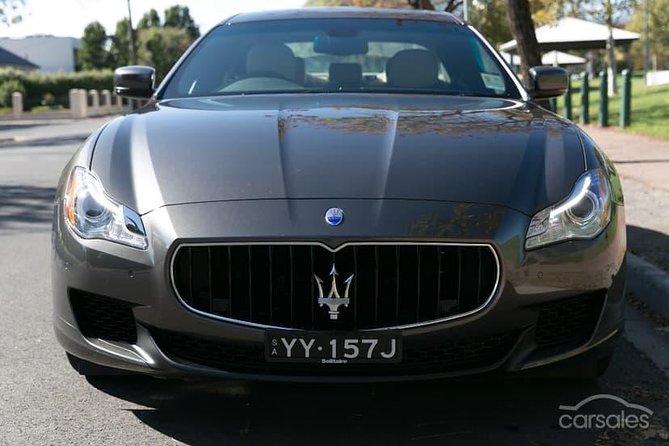 Maserati Quattroporte Limousine Transfer Cairns Airport to City - Booking Information
