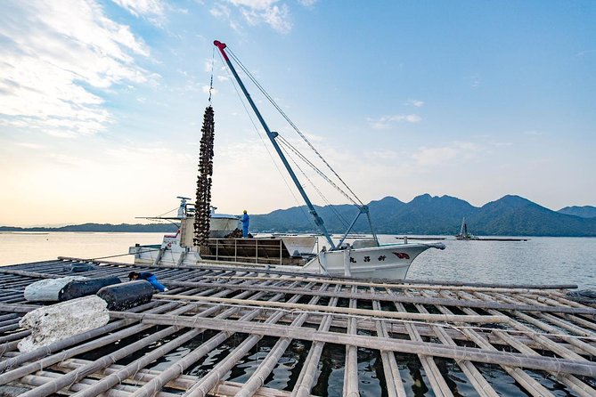 Visit World Heritage Site Itsukushima Shrine by Sea & Oyster Raft Tour - Meeting and Pickup