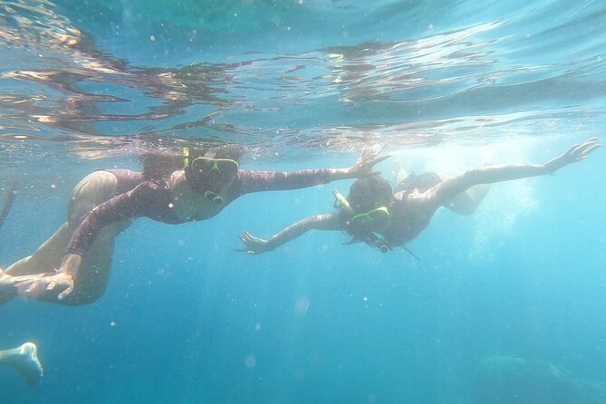Snorkeling And West Penida Beach Tour All Inclusive - Traveler Engagement