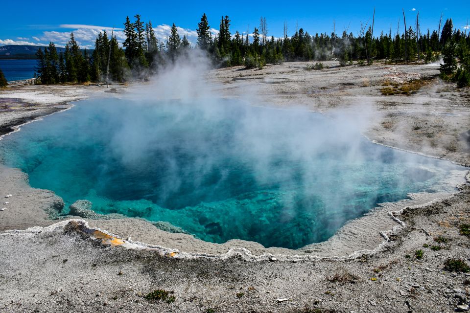 From Cody: Full-Day Yellowstone National Park Tour - Departure Location and Key Attractions
