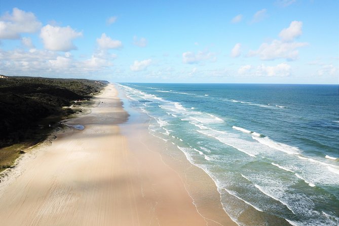 Hervey Bay to Fraser Island 4WD Tour With Lake Mckenzie Swim - Key Points