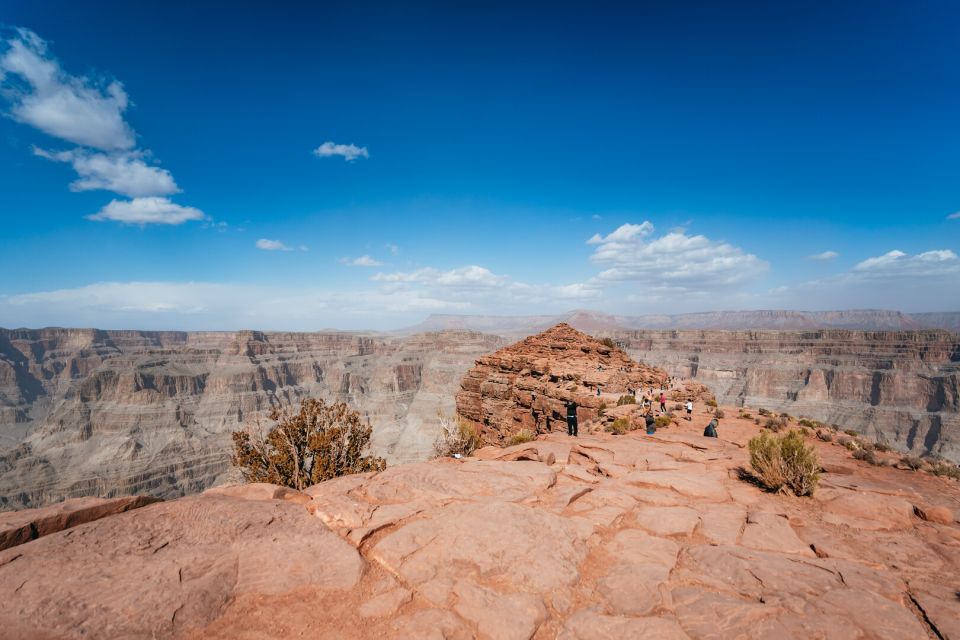 Las Vegas: Grand Canyon West Bus Tour With Hoover Dam Stop - Tour Duration and Language