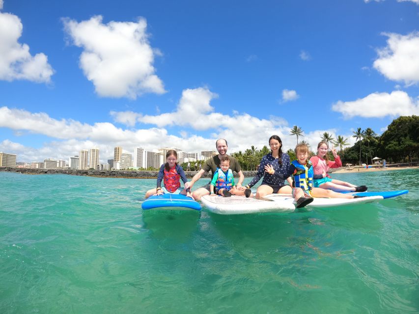 Family Surfing Lesson: 1 Parent, 1 Child Under 13, & Others - Instructor and Pickup