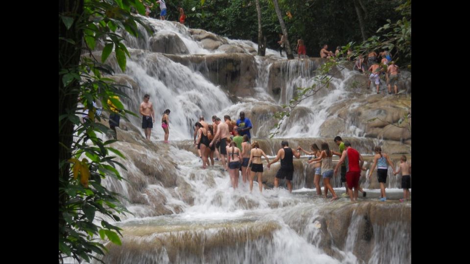 Montego Bay: River Rafting and Dunns River Falls Day Trip - Activity Description