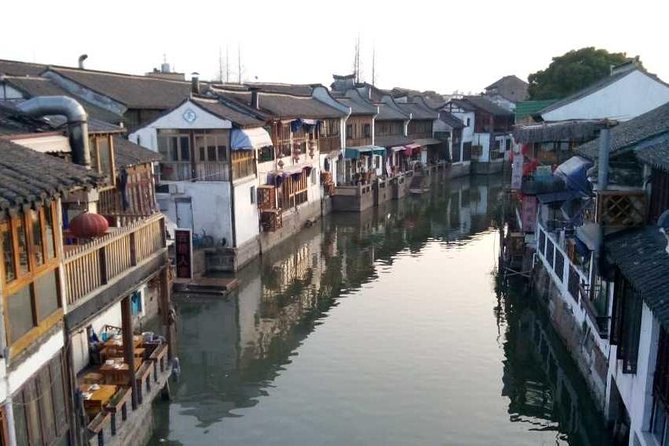 Half-Day Private Zhujiajiao Water Town Tour With Boat Ride From Shanghai - Boat Ride and Garden Visit