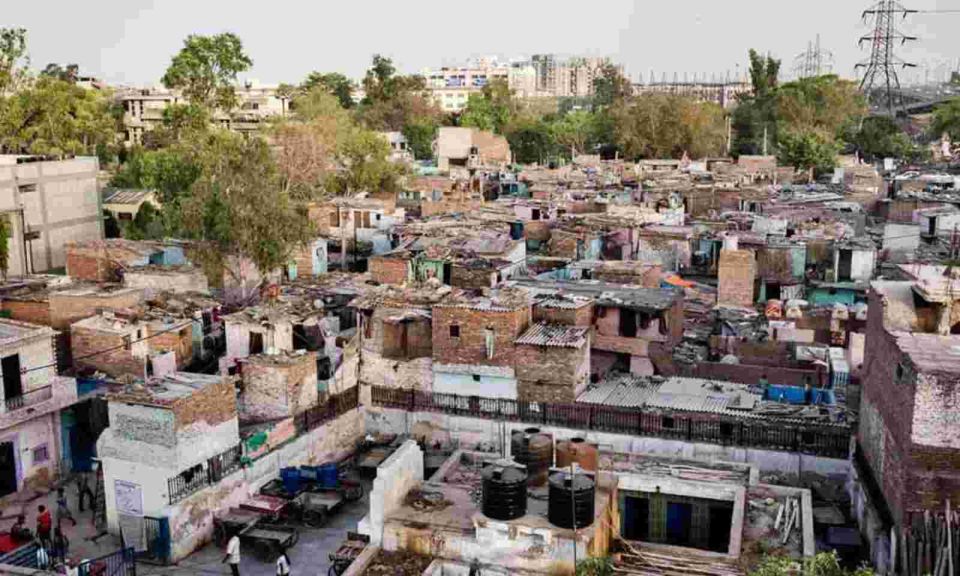 Delhi Half Day Slum Walking Tour With Guide - Key Points