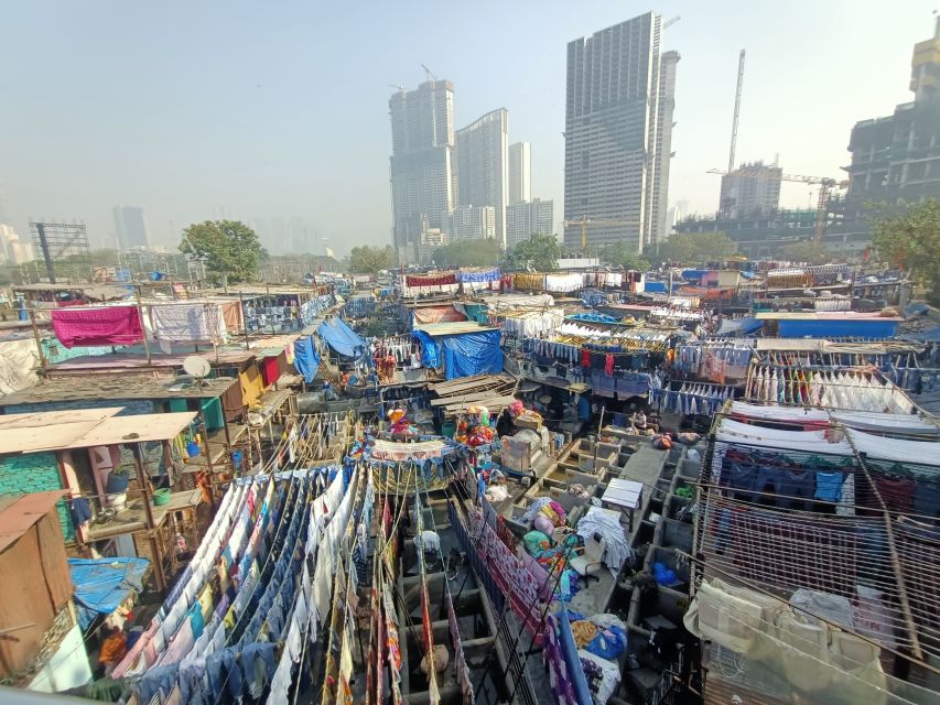 Mumbai: Dhobi Ghat Tour With Dharavi and Train Ride Options - Key Points