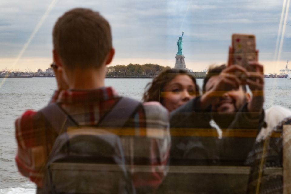 New York City: Guided Highlights Bus Tour and Ferry Ride - Key Points